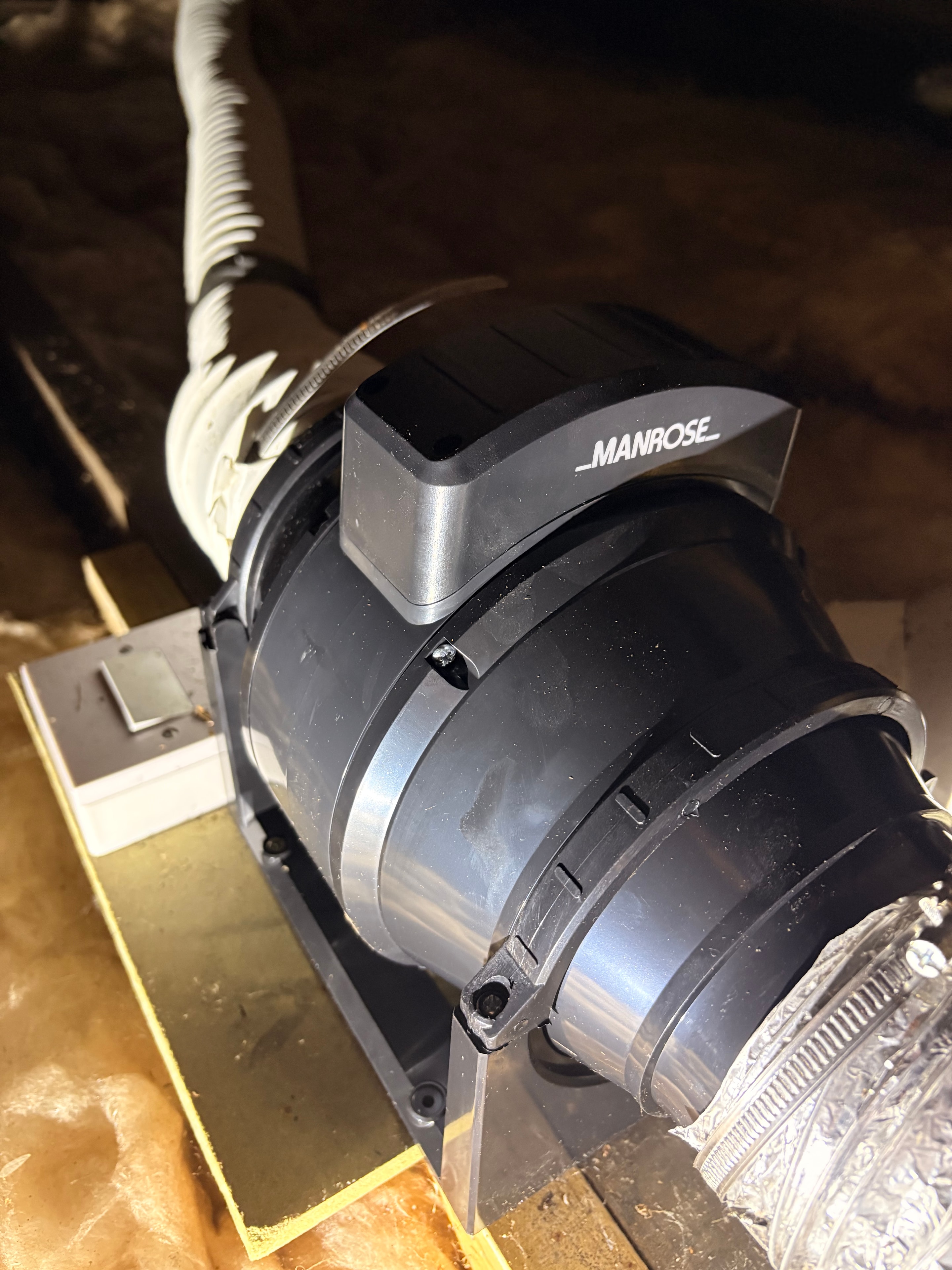 Close-up of the new Manrose inline fan unit in the loft