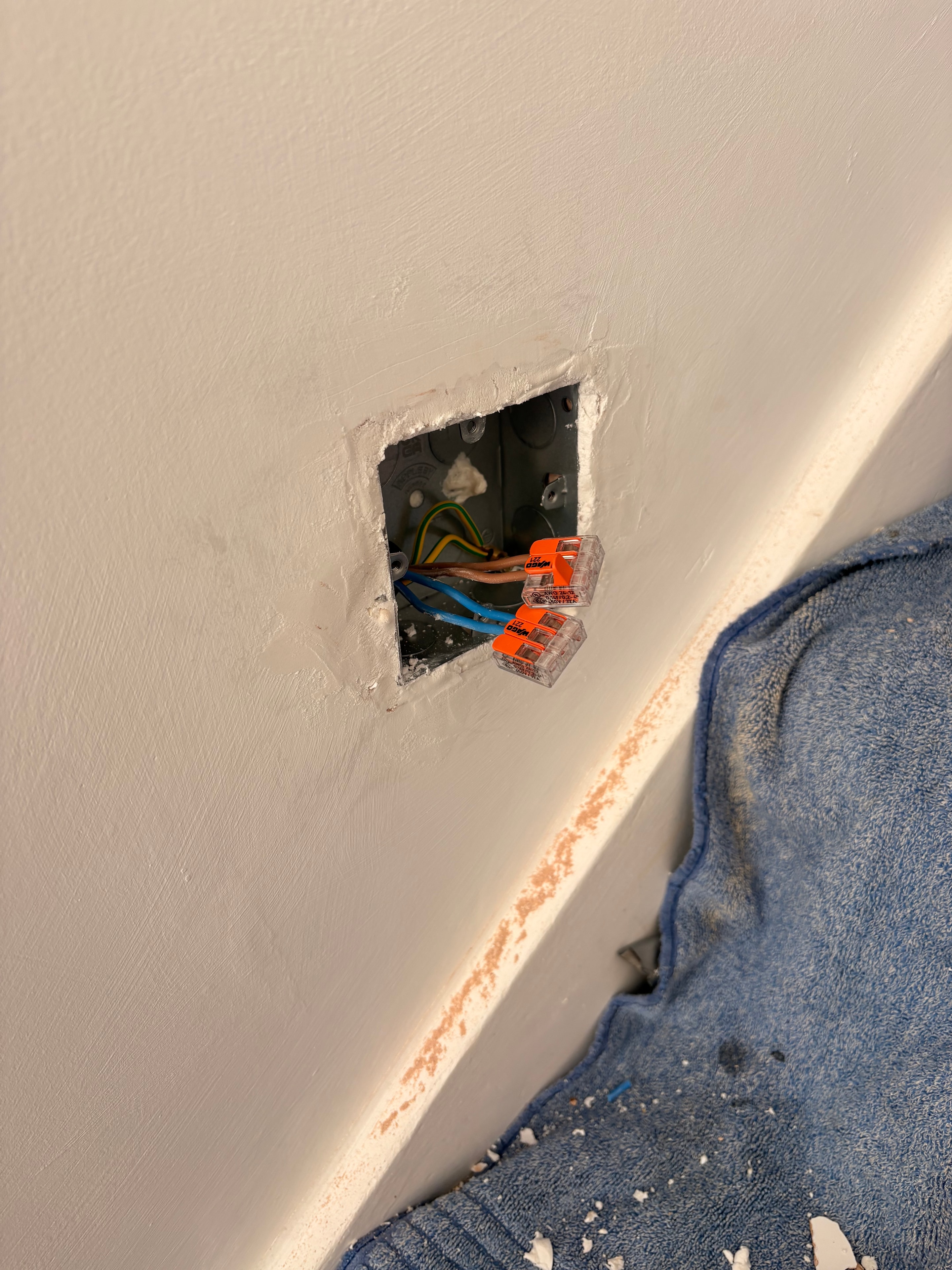 Wiring connections inside a flush box during the 12V to 230V conversion